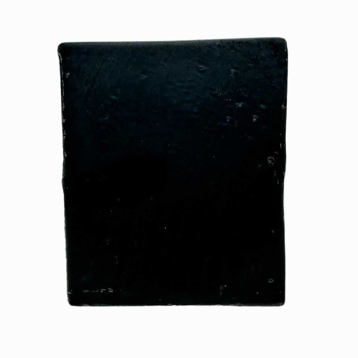 Klichy Charcoal Detox Bar natural soap texture close-up, mild grit from bentonite clay, sea clay, and activated charcoal