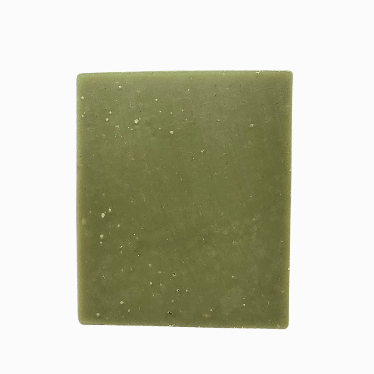 Close-up of Klichy Haze Natural Soap Bar's textured surface with visible pumice and sea clay grit