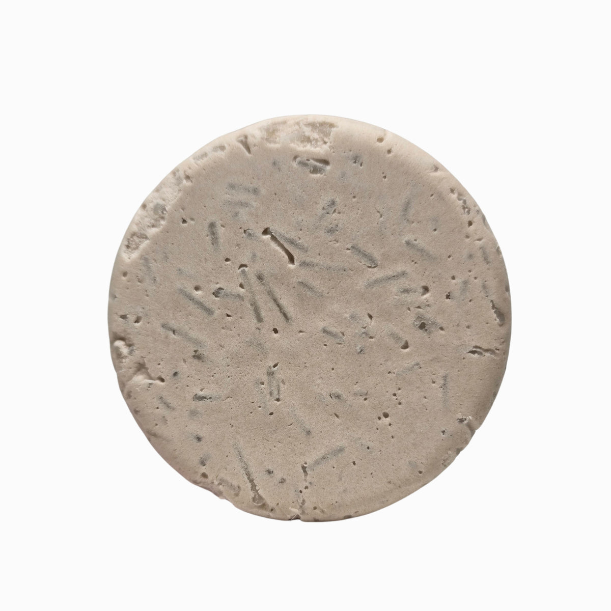 Klichy Onyx Natural Shampoo Bar close-up of the puck, Vanilla & Cedarwood scent